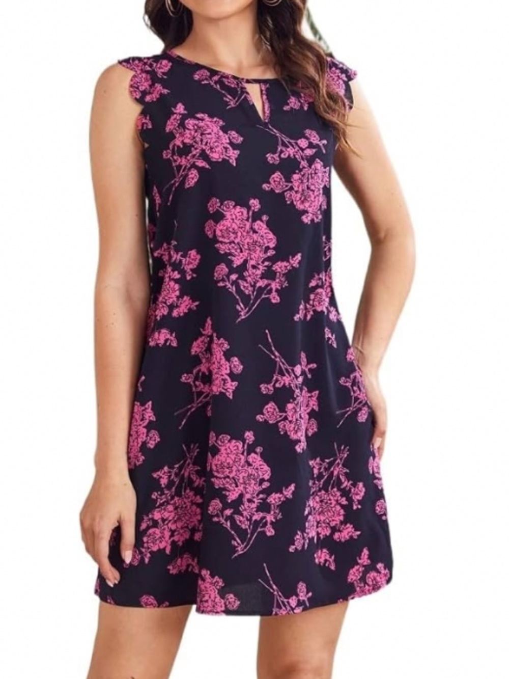 Chic sleeveless dress in blue with vibrant pink floral print. Lightweight, flatt
